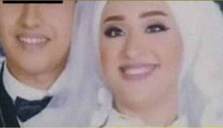 الزوج والزوجة فى صورة الزفاف